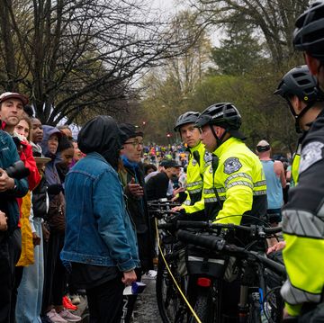boston police block a group of fans at the 2023 boston marathon boston police block a group of fans at the 2023 boston marathon